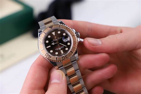 rolling Rolex watch manually